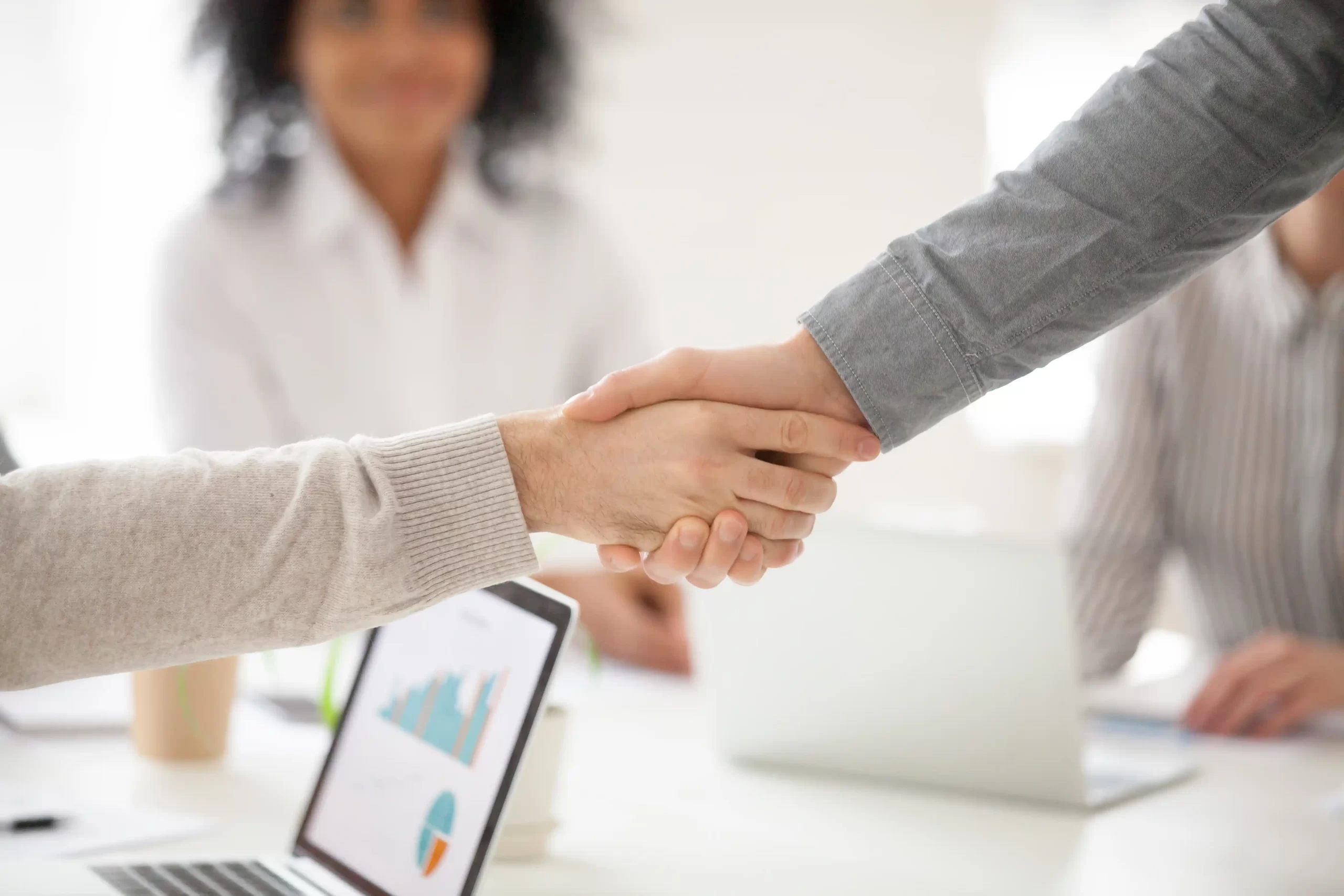 business-partners-handshaking-group-meeting-making-project-investment-closeup