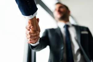 handshake business men
